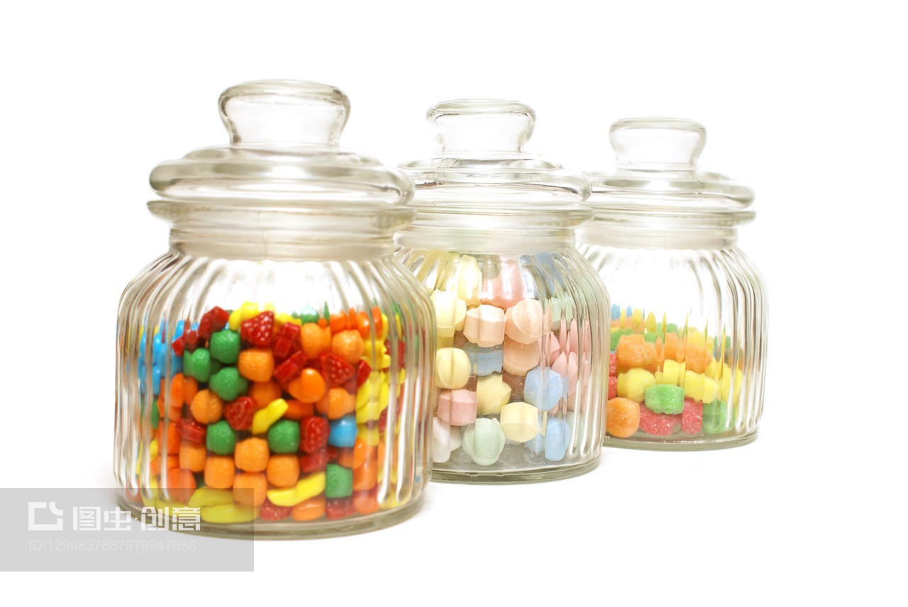 甜蜜的容器 糖果罐中的糖